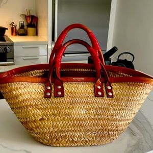 Balenciaga raffia bag.  Natural raffia color with cognac leather trim.